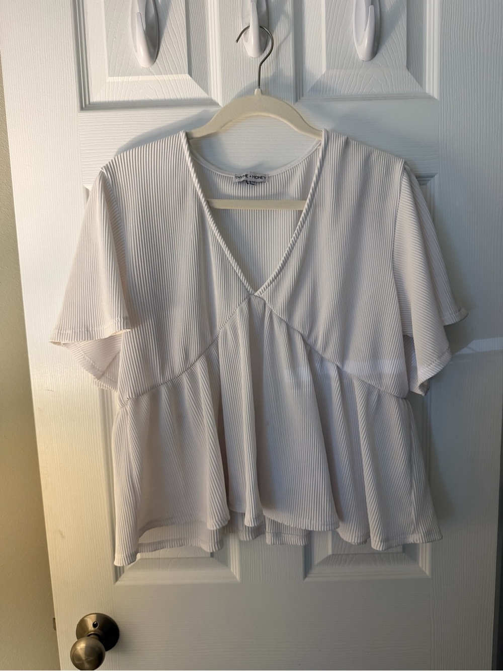 White Pleated V-Neck Peplum Blouse - Women